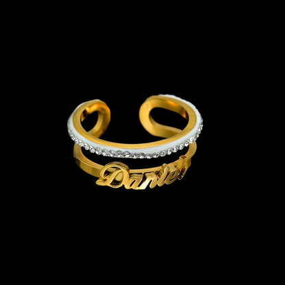 Gold ring with custom name and sparkling stones