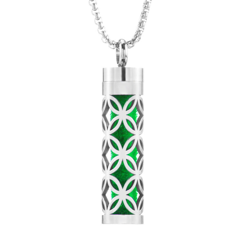 "Aromatherapy pendant with hollow patterns, stainless steel, ideal for essential oil diffusion."
