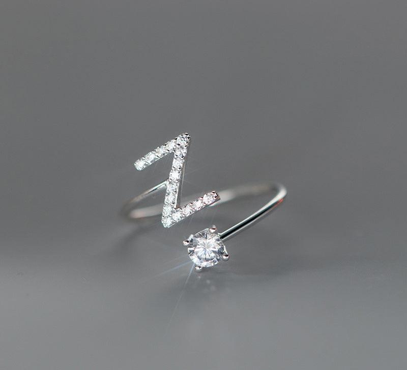 Customizable sterling silver ring with delicate diamond
