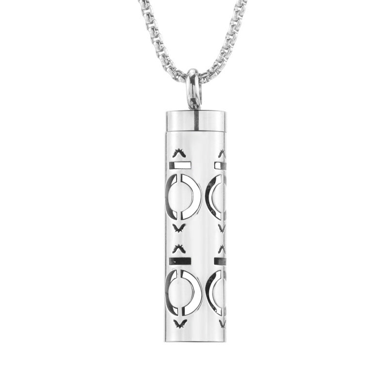 "Elegant hollow aromatherapy pendant in stainless steel for essential oil use."
